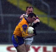 29 October 2000; Donal Casserly of Roscommon is tackled by Fergal Gavin of Galway during the Church & General National Football League Division 1A match between Roscommon and Galway at Dr Hyde Park in Roscommon. Photo by Damien Eagers/Sportsfile
