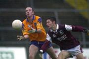 29 October 2000; Ger Mockler of Roscommon in action against Noel Meehan of Galway during the Church & General National Football League Division 1A match between Roscommon and Galway at Dr Hyde Park in Roscommon. Photo by Damien Eagers/Sportsfile