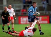 29 October 2000; Darren Homan of Dublin in action against Stephen O'Neill of Tyrone during the Church & General National Football League Division 1A match between Dublin and Tyrone at Parnell Park in Dubln. Photo by Ray McManus/Sportsfile