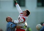29 October 2000; Vinny Murphy of Dublin in action against Ryan McMenamin of Tyrone during the Church & General National Football League Division 1A match between Dublin and Tyrone at Parnell Park in Dubln. Photo by Ray McManus/Sportsfile