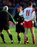 29 October 2000; Referee John Geaney is handed a pen by his linesman during the Church & General National Football League Division 1A match between Dublin and Tyrone at Parnell Park in Dubln. Photo by Ray McManus/Sportsfile