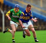 30 October 2000; Ciarán Carey of Patrickswell in action against Michael Bevans of Toomevara during the AIB Munster Senior Club Hurling Championship Quarter-Final match between Toomevara and Patrickswell at Semple Stadium in Thurles, Tipperary. Photo by Ray McManus/Sportsfile
