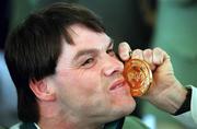 1 November 2000; Irish paralympian Gay Shelly, from Kilkenny, poses with his Boccia gold medal as the Ireland paralympic team return home to Dublin Airport from the 2000 Paralympic Games in Sydney, Australia. Photo by Brendan Moran/Sportsfile