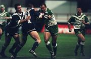 1 November 2000; Chris Joynt of Ireland is tackled by Matt Daylight of Scotland during the 2000 Rugby League World Cup Group 4 match between Ireland and Scotland at Tolka Park in Dublin. Photo by Brendan Moran/Sportsfile