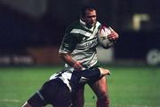 1 November 2000; Chris Joynt of Ireland is tackled by Scott Rhodes of Scotland during the 2000 Rugby League World Cup Group 4 match between Ireland and Scotland at Tolka Park in Dublin. Photo by Brendan Moran/Sportsfile