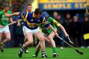 30 October 2000; Gary Kirby of Patrickswell in action against John O'Brien of Toomevara during the AIB Munster Senior Club Hurling Championship Quarter-Final match between Toomevara and Patrickswell at Semple Stadium in Thurles, Tipperary. Photo by Ray McManus/Sportsfile