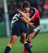 3 November 2000; Tom Tierney of Munster is tackled by Eddie Hekenui of Leinster during the Guinness Interprovincial Championship match between Leinster and Munster at Donnybrook Stadium in Dublin. Photo by Matt Browne/Sportsfile