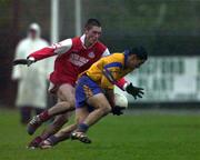 5 November 2000; Jason Sherlock of Na Fianna in action against Donal Ledwith of Abbeylara during the AIB Leinster Senior Club Football Championship Quarter-Final match between Abbeylara and Na Fianna at Pearse Park in Longford. Photo by Ray McManus/Sportsfile