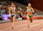 26 August 2015; Kelly Proper of Ireland, right, and Isidora Jimenez of Chile in action during the heats of the Women's 200m event. IAAF World Athletics Championships Beijing 2015 - Day 5, National Stadium, Beijing, China. Picture credit: Stephen McCarthy / SPORTSFILE