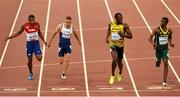 26 August 2015; Athletes, from left, Roberto Skyers of Cuba, Daniel Taylor of Great Britain, Usain Bolt of Jamaica, and Anaso Jobodwana of South Africa in action during the semi-finals of the Men's 200m event. IAAF World Athletics Championships Beijing 2015 - Day 5, National Stadium, Beijing, China. Picture credit: Stephen McCarthy / SPORTSFILE