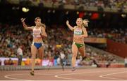 26 August 2015; Kelly Proper of Ireland, right, and Isidora Jimenez of Chile in action during the heats of the Women's 200m event. IAAF World Athletics Championships Beijing 2015 - Day 5, National Stadium, Beijing, China. Picture credit: Stephen McCarthy / SPORTSFILE