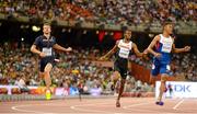 26 August 2015; Athletes, from left, Christophe Lemaitre of France, Brendon Rooney of Canada, and Zharnel Hughes of Great Britain in action during the semi-finals of the Men's 200m event. IAAF World Athletics Championships Beijing 2015 - Day 5, National Stadium, Beijing, China. Picture credit: Stephen McCarthy / SPORTSFILE