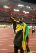 27 August 2015; Usain Bolt of Jamaica after winning the final of the Men's 200m event. IAAF World Athletics Championships Beijing 2015 - Day 6, National Stadium, Beijing, China. Picture credit: Stephen McCarthy / SPORTSFILE