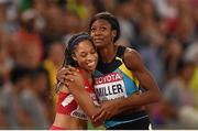 27 August 2015; Allyson Felix of USA is congratulated by second placed Shaunae Miller of the Bahamas after winning the final of the Women's 400m event. IAAF World Athletics Championships Beijing 2015 - Day 6, National Stadium, Beijing, China. Picture credit: Stephen McCarthy / SPORTSFILE