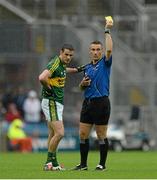 23 August 2015; Referee Maurice Deegan issues Shane Enright, Kerry, with a yellow card in the second half. GAA Football All-Ireland Senior Championship, Semi-Final, Kerry v Tyrone. Croke Park, Dublin. Picture credit: Oliver McVeigh / SPORTSFILE
