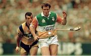 3 September 1995; Daithí Regan, Offaly, in action against Ollie Baker, Clare. All-Ireland Hurling Final, Clare v Offaly, Croke Park, Dublin. Picture credit; SPORTSFILE