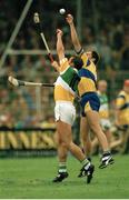 3 September 1995; Johnny Dooley, Offaly, in action against Anthony Daly, Clare. All-Ireland Hurling Final. Clare v Offaly. Croke Park, Dublin. Picture credit; Brendan Moran / SPORTSFILE