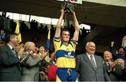 3 September 1995; Clare captain Anthony Daly lifts the Liam MacCarthy Cup alongside, from left, Liam Mulvihill, Director General of the GAA, The President of Ireland Patrick Hillary, and GAA President Jack Boothman. All-Ireland Hurling Final, Clare v Offaly, Croke Park, Dublin. Picture credit; SPORTSFILE