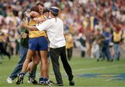 3 September 1995; Clare players Ollie Baker, facing, and P.J. O'Connell celebrate with supporters at the final whistle. All-Ireland Hurling Final, Clare v Offaly, Croke Park, Dublin. Picture credit; SPORTSFILE