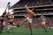 3 September 1995; Offaly goal keeper David Hughes in action against Clare players Ger O'Loughlin, left, and Éamonn Taaffe. Also pictured, Martin Hanamy, Offaly, right. All-Ireland Hurling Final, Clare v Offaly, Croke Park, Dublin. Picture credit; SPORTSFILE