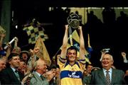 3 September 1995; Clare captain Anthony Daly lifts the Liam MacCarthy Cup alongside, from left, Liam Mulvihill, Director General of the GAA, The President of Ireland Patrick Hillary, and GAA President Jack Boothman. All-Ireland Hurling Final, Clare v Offaly, Croke Park, Dublin. Picture credit; SPORTSFILE