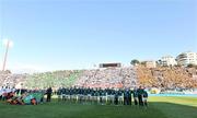 15 February 2009; The Ireland squad stand for the national anthem as the fans in the stand behind display the Irish tricolour. RBS Six Nations Championship, Italy v Ireland, Stadio Flaminio, Rome, Italy. Picture credit: Brendan Moran / SPORTSFILE