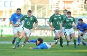 15 February 2009; Jamie Heaslip, Ireland, races clear of Paul Griffen, Italy. RBS Six Nations Championship, Italy v Ireland, Stadio Flaminio, Rome, Italy. Picture credit: Brendan Moran / SPORTSFILE