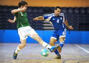 19 February 2009; Georghios Georghiou, Cyprus, in action against Ian Byrne, Republic of Ireland. UEFA Futsal Championship 2010 Qualifying Tournament, Republic of Ireland v Cyprus, National Basketball Arena, Tallaght, Co. Dublin. Picture credit: Pat Murphy / SPORTSFILE