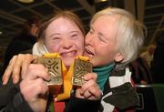 16 February 2009; Clara Keoghan, TEAM Ireland, sponsored by eircom, from Ballsbridge, Dublin, who won two Bronze medals at the Special Olympics World Winter Games, gets a congratulatory kiss from her mother Phil on her arrival home at Dublin Airport. Photo by Sportsfile