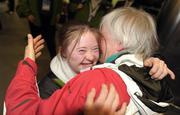 16 February 2009; Clara Keoghan, TEAM Ireland, sponsored by eircom, from Ballsbridge, Dublin, who won two Bronze medals at the Special Olympics World Winter Games, hugs her mother Phil on her arrival home at Dublin Airport. Photo by Sportsfile