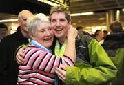 16 February 2009; Cathal Murphy, TEAM Ireland, sponsored by eircom, from Scarriff, Co. Clare, who won two Silver medals at the Special Olympics World Winter Games, with his mother Mary, on his arrival home at Dublin Airport. Picture credit: Ray McManus / SPORTSFILE