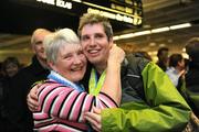 16 February 2009; Cathal Murphy, TEAM Ireland, sponsored by eircom, from Scarriff, Co. Clare, who won two Silver medals at the Special Olympics World Winter Games, with his mother Mary, on his arrival home at Dublin Airport. Picture credit: Ray McManus / SPORTSFILE