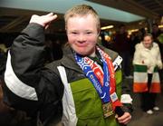 16 February 2009; Ben Purcell, TEAM Ireland, sponsored by eircom, from Dalkey, Co. Dublin, who won a Gold medal at the Special Olympics World Winter Games, on his arrival home at Dublin Airport. Picture credit: Ray McManus / SPORTSFILE