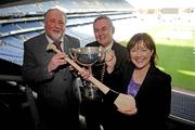 20 February 2009; The GAA has confirmed that top level hurling will be played in the Middle East for the first time next month when the final of the 2009 M Donnelly Inter-provincial Hurling Championship will be played in Abu Dhabi thanks to a novel arrangement with hurling championship sponsors Etihad and the Abu Dhabi Tourism Authority. Pictured after the 2009 M Donnelly Inter-Provincial Hurling Championship final presented by Etihad Press Conference are, from left, Competition sponsor Martin Donnelly, GAA President-elect Christy Cooney and Beatrice Cosgrove, Etihad Airways. Croke Park, Dublin. Picture credit: Stephen McCarthy / SPORTSFILE