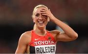28 August 2015; Cindy Roleder of Germany reacts after finishing second in the final of the Women's 100m Hurdle event. IAAF World Athletics Championships Beijing 2015 - Day 7, National Stadium, Beijing, China. Picture credit: Stephen McCarthy / SPORTSFILE