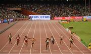 28 August 2015; Dafne Schippers of the Netherland (4th from left) crosses the finish line to win the final of the Women's 200m event. Also pictured are from left, Sherone Simpson of Jamaica, Jeneba Tarmoh of USA, Candyce McGrone of USA, Elaine Thompson of Jamaica, Dina Asher-Smith of Great Britain, Ivet Lalova-Collio of Bulgaria and Veronic Campbell-Brown of Jamaica. IAAF World Athletics Championships Beijing 2015 - Day 7, National Stadium, Beijing, China. Picture credit: Stephen McCarthy / SPORTSFILE