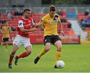 28 August 2015; Aaron Barry, Derry City, in action against Morgan Langley, St Patrick's Athletic. SSE Airtricity League Premier Division, St Patrick's Athletic v Derry City, Richmond Park, Dublin. Picture credit: Sam Barnes / SPORTSFILE