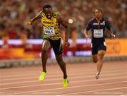 29 August 2015; Usain Bolt crosses the line to win the final of the Men's 4x100m Relay event for his Jamaica team. The team consisted of Nesta Carter, Asafa Powell, Nickle Ashmeade and Usain Bolt. IAAF World Athletics Championships Beijing 2015 - Day 8, National Stadium, Beijing, China. Picture credit: Stephen McCarthy / SPORTSFILE