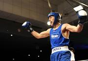 20 February 2009; Philip Sutcliffe, Crumlin, celebrates after his victory over John Joe Joyce, St Michael's Athy, in their 64KG bout. National Senior Boxing Championships Finals, National Stadium, Dublin. Picture credit: Ray Lohan / SPORTSFILE