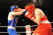 20 February 2009; Willie McLoughlin, Illes Golden Gloves, red, in action against Cathal McCauley, Dungloe. National Elite Boxing Championships Finals, 69kg, National Stadium, Dublin. Picture credit: Ray Lohan / SPORTSFILE