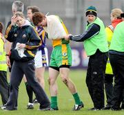 21 February 2009; Kieran Fitzgerald, Corofin captain, is taken off the pitch injured during the match. AIB All-Ireland Senior Club Football Championship Semi-Final, Corofin v Kilmacud Crokes, Cusack Park, Mullingar, Co. Westmeath. Picture credit: Ray Ryan / SPORTSFILE