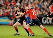 21 February 2009; Chris Paterson, Edinburgh, is tackled by Keith Earls, Munster. Magners League, Munster v Edinburgh, Musgrave Park, Cork. Picture credit: Matt Browne / SPORTSFILE