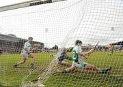22 February 2009; Ballyhale Shamrocks players, from left, Padraig Holden, James Connolly, and Paul Shefflin, can only watch on as Joe Canning of Portumna's penalty hits the back of the net. AIB All-Ireland Senior Club Hurling Championship Semi-Final, Ballyhale Shamrocks v Portumna, Semple Stadium, Thurles, Co. Tipperary. Picture credit: Brian Lawless / SPORTSFILE