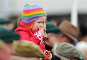 22 February 2009; Two-and-a-half-year-old Charlotte Gibson, from Kent, England, watches the horses in the parade ring before the start of the main race. Naas Racecourse, Woodlands Park, Co. Kildare. Picture credit: Matt Browne / SPORTSFILE