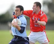 22 February 2009; Ted Furman, Dublin, in action against Gerard Hoey, Louth. Cadbury U21 Leinster Football Championship, Round 1, Louth v Dublin, Drogheda, Co. Louth. Picture credit: Oliver McVeigh / SPORTSFILE