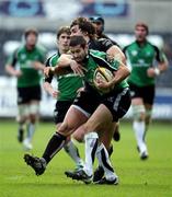 22 February 2009; Frank Murphy, Connacht Rugby, takes the high ball under pressure from Gareth Owen, Ospreys. Magners League, Ospreys v Connacht Rugby, Liberty Stadium, Wales. Picture credit: Steve Pope / SPORTSFILE