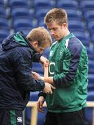 24 February 2009; Luke Fitzgerald is strapped up by team physio Brian Green during Ireland rugby squad training ahead of their RBS Six Nations game against England on Saturday. RDS, Dublin. Picture credit: Brendan Moran / SPORTSFILE