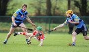 25 February 2009; Ryan Clifford, Cork IT, is tackled by Oisin Gough, right, and Sean Cummins, UCD. Ulster Bank Fitzgibbon Cup Quarter-Final,Cork IT v UCD, CIT Sports Stadium , Cork. Picture credit: Matt Browne / SPORTSFILE     *** Local Caption ***