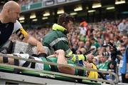 29 August 2015 Ireland's Keith Earls is stretchered from the field after an injury in the second half, accompanied by team doctor Eanna Falvey. Rugby World Cup Warm-Up Match, Ireland v Wales, Aviva Stadium, Lansdowne Road, Dublin. Picture credit: Brendan Moran / SPORTSFILE