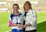 29 August 2015; Aileen Wall, Waterford, is presented with the LGFA / TG4 Player of the Match by Marie Hickey, President, Ladies Gaelic Football Association. TG4 Ladies Football All-Ireland Intermediate Championship, Semi-Final, Leitrim v Waterford, Gaelic Grounds, Limerick. Picture credit: Piaras Ó Mídheach / SPORTSFILE